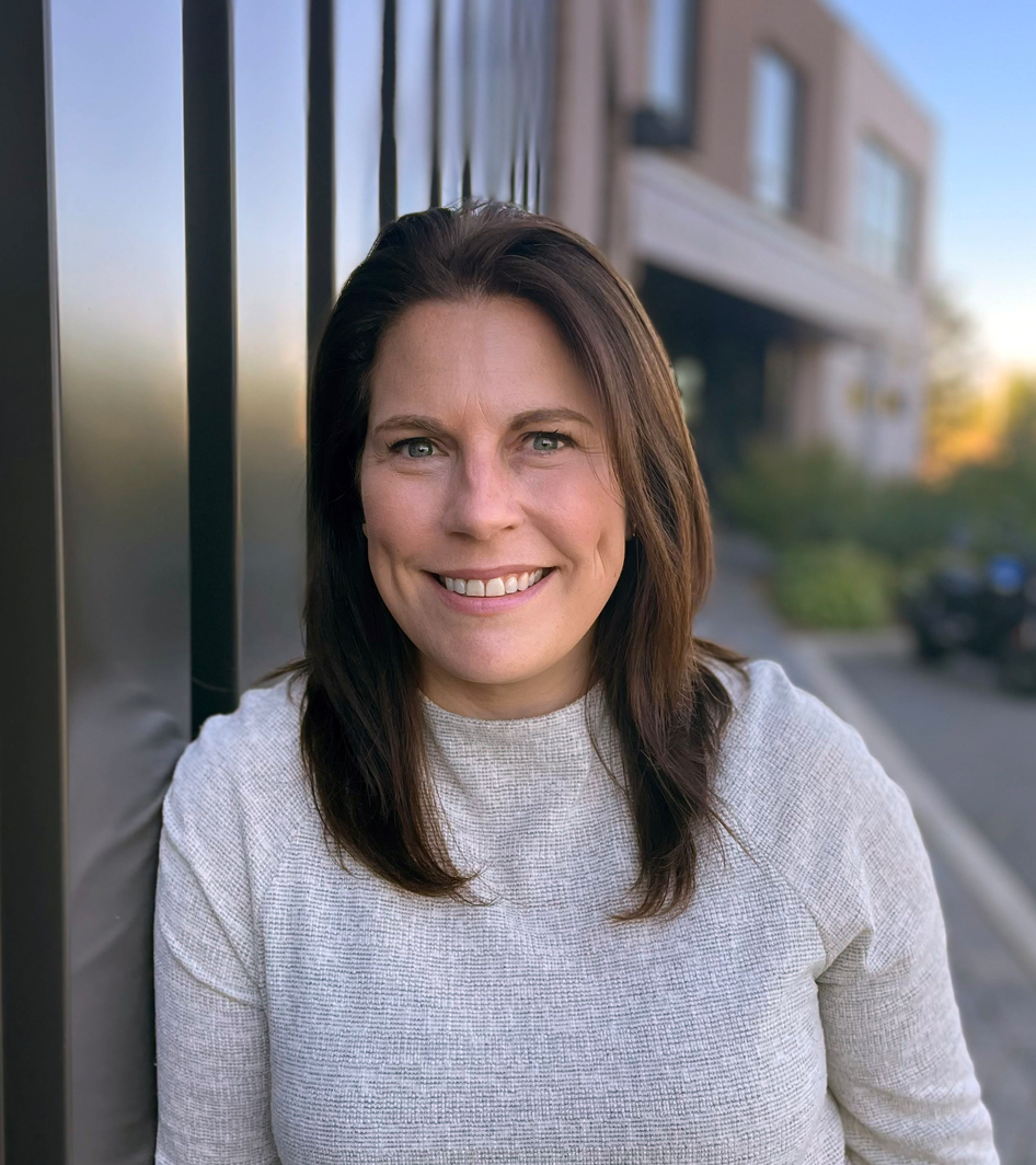Photo of Krista Akerman standing outside