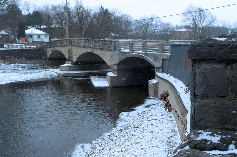 Photos of bridge over water in winter