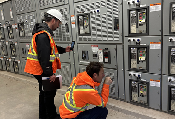 Employees conducting energy audit