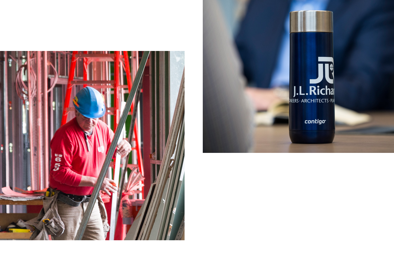 Man in hard hat at construction site, water bottle with J.L. Richards logo